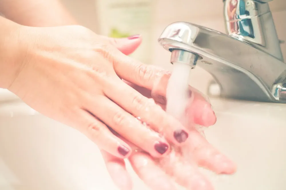 woman washing hands